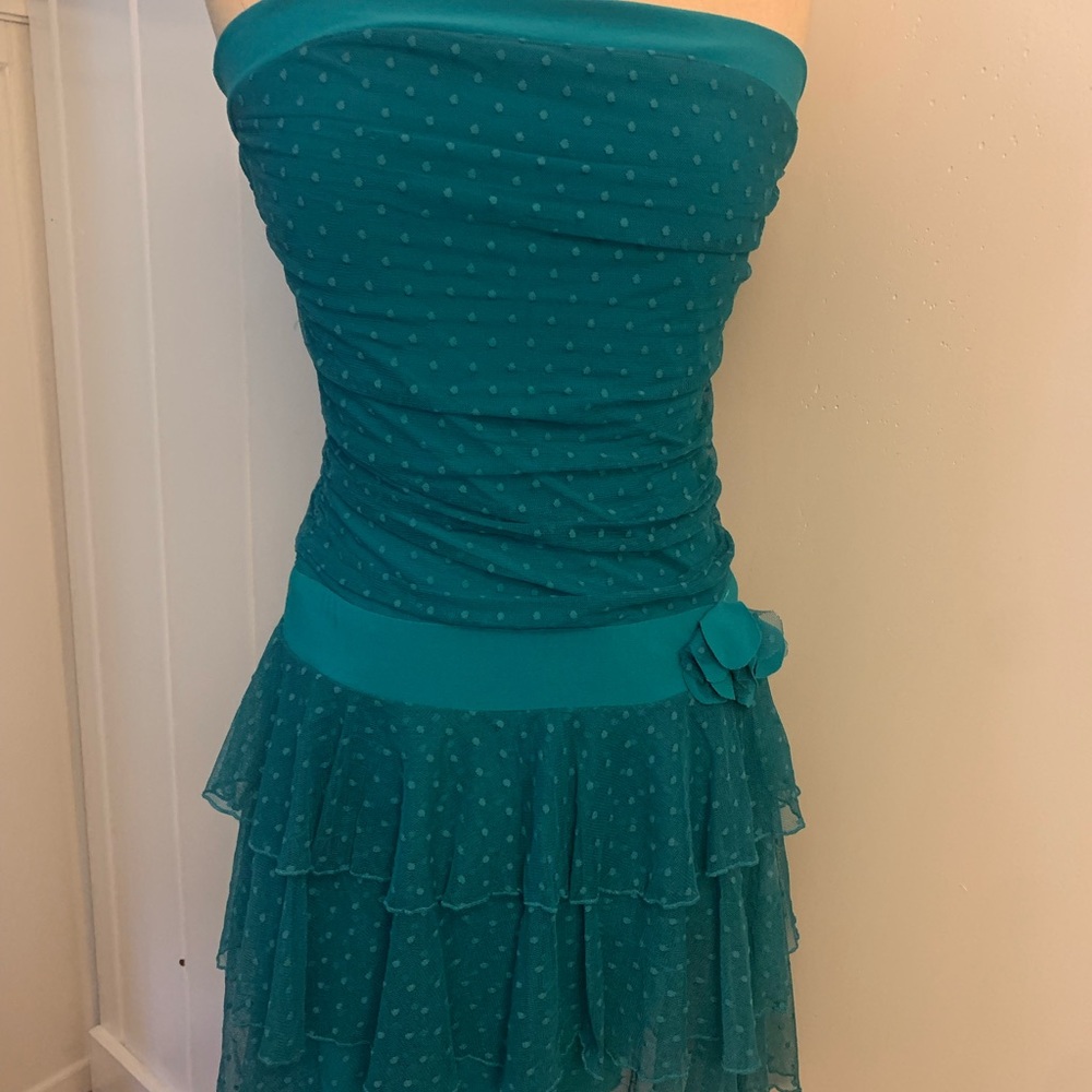 Stretch material, machine machine or hand wash.   Never worn. New without tags.